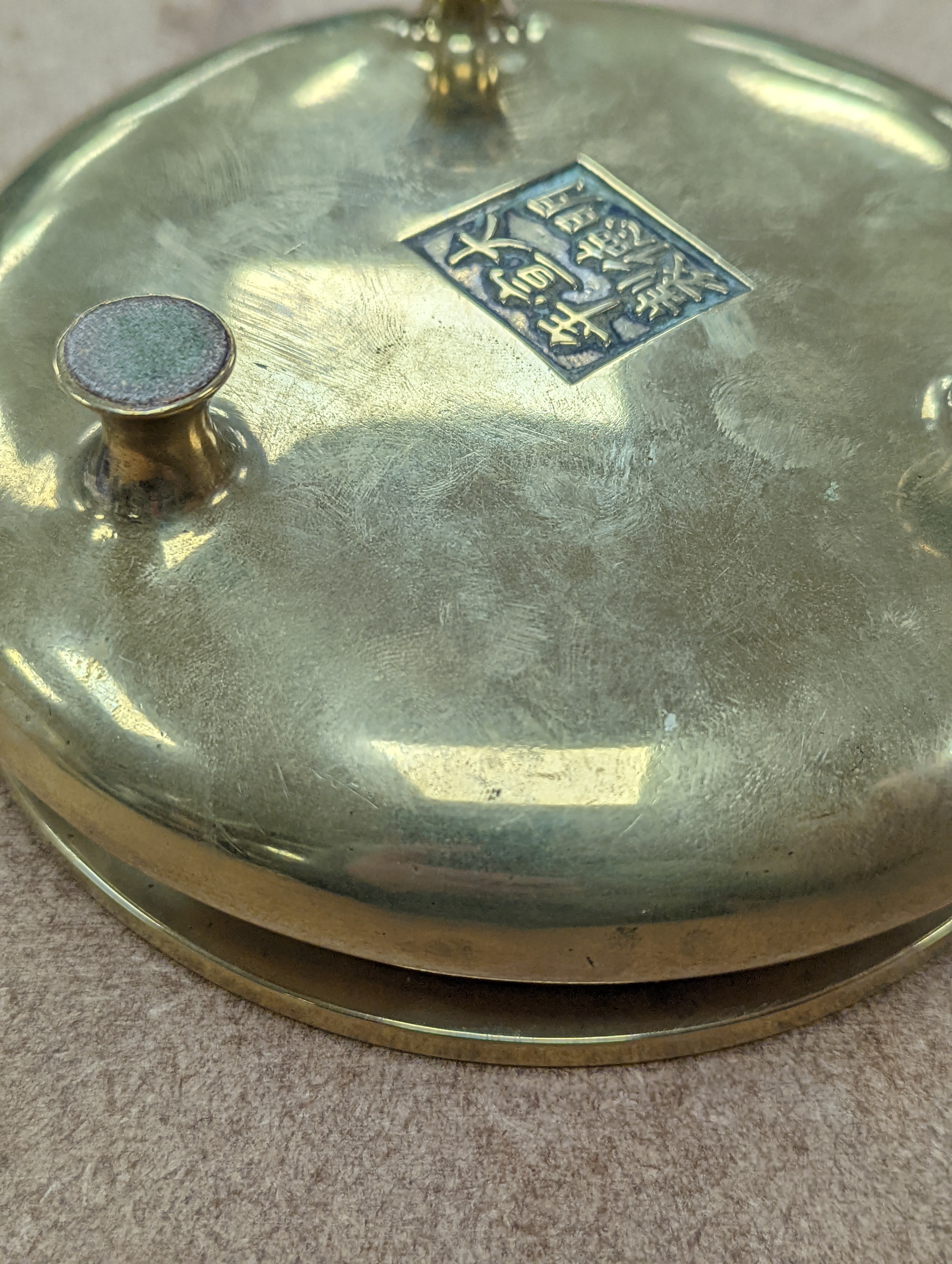 A Chinese bronze censer, ding, Xuande mark, 18th / 19th century, diameter 16.6cm, height 6.7cm